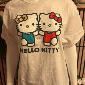 White Hello Kitty graphic tee with blue and red kitty